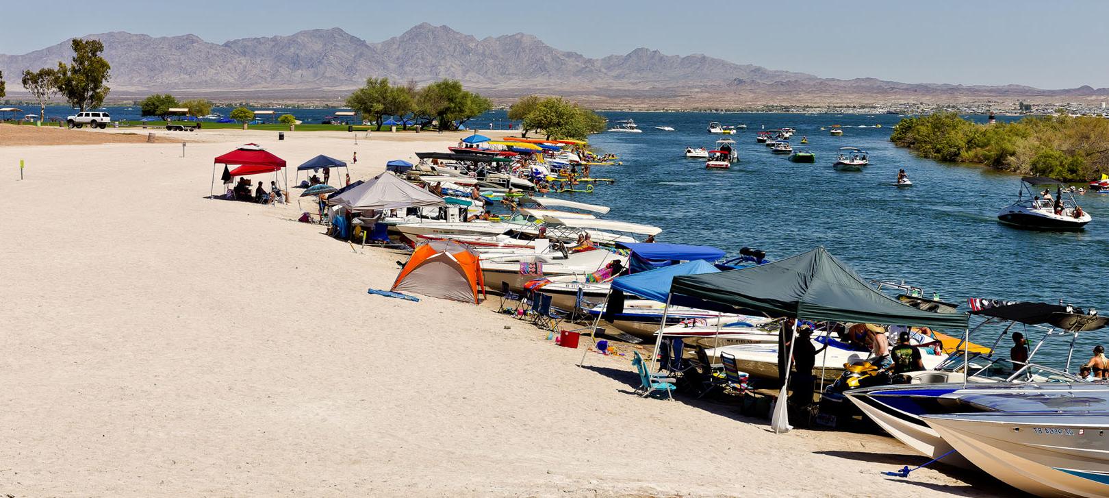 Boats parked on beach on Lake Havasu