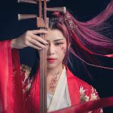 woman holding shamisen